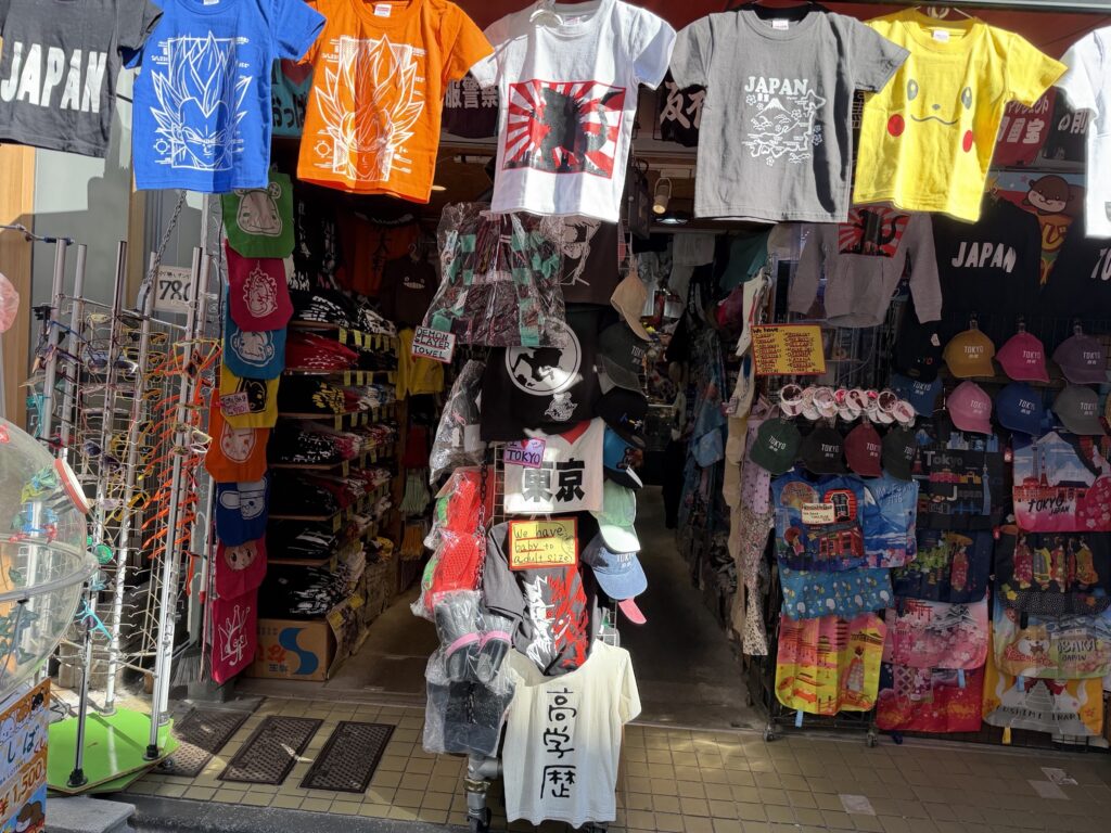 Harajuku souvenir shop entrance with T-shirts and Japanese gifts